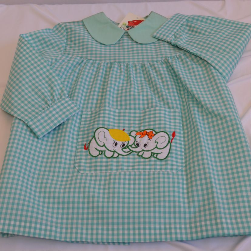 babi escolar verde y blanco con estampado