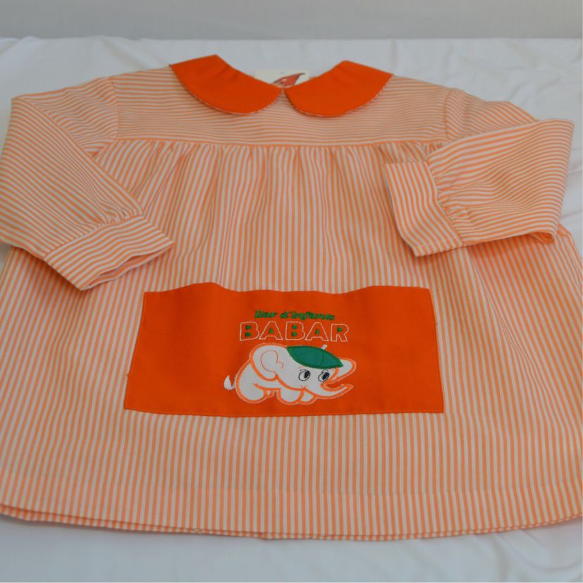 babi escolar naranja con estampado